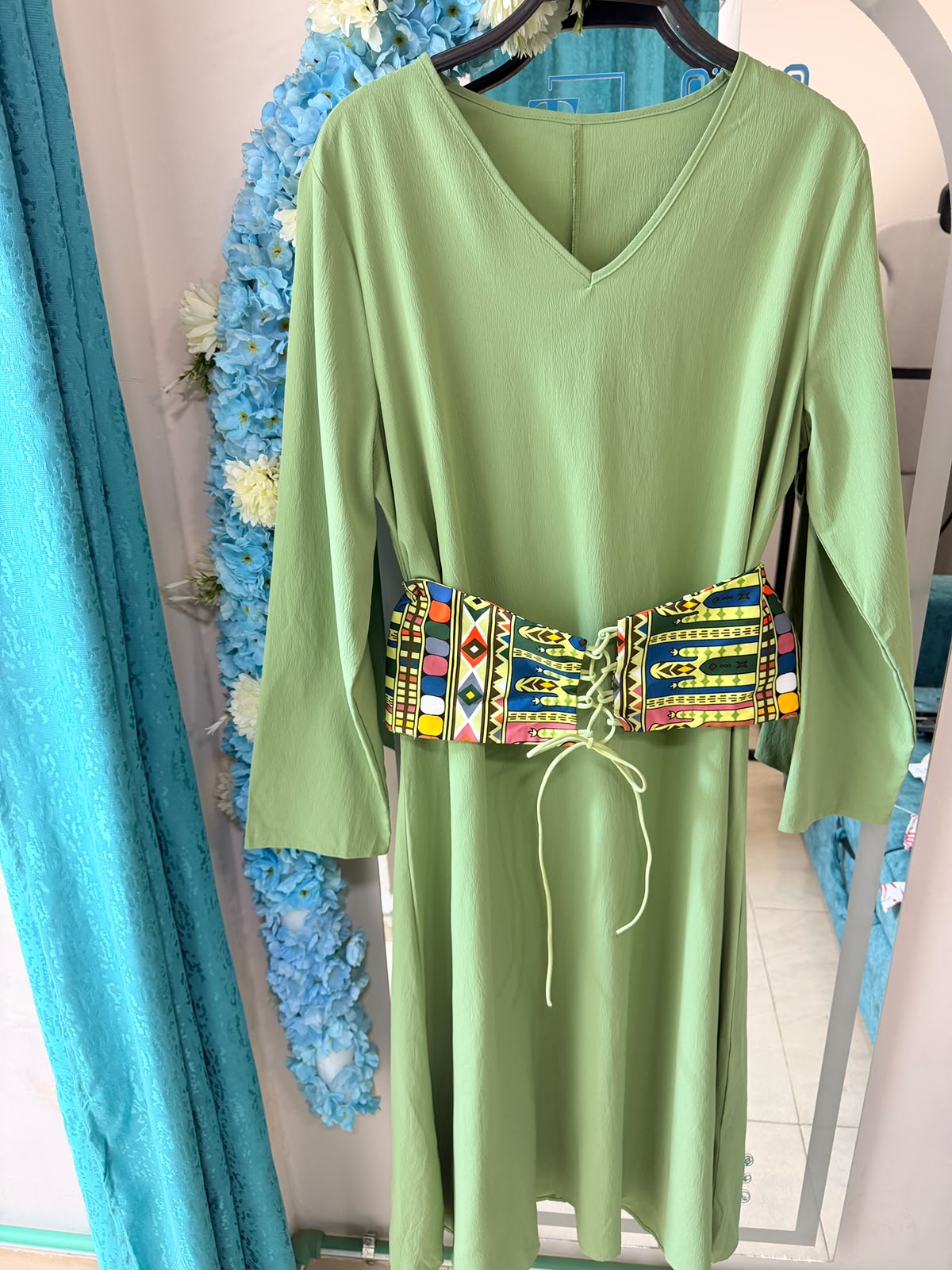 sage green with colorful tribal belt