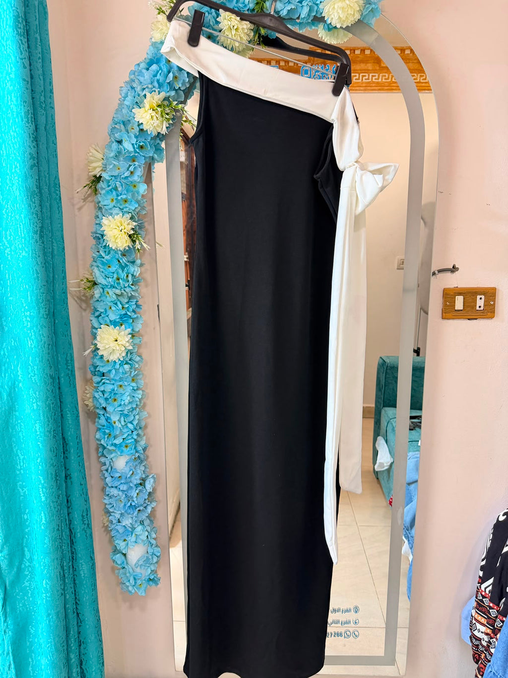 one shoulder black dress with white detailing