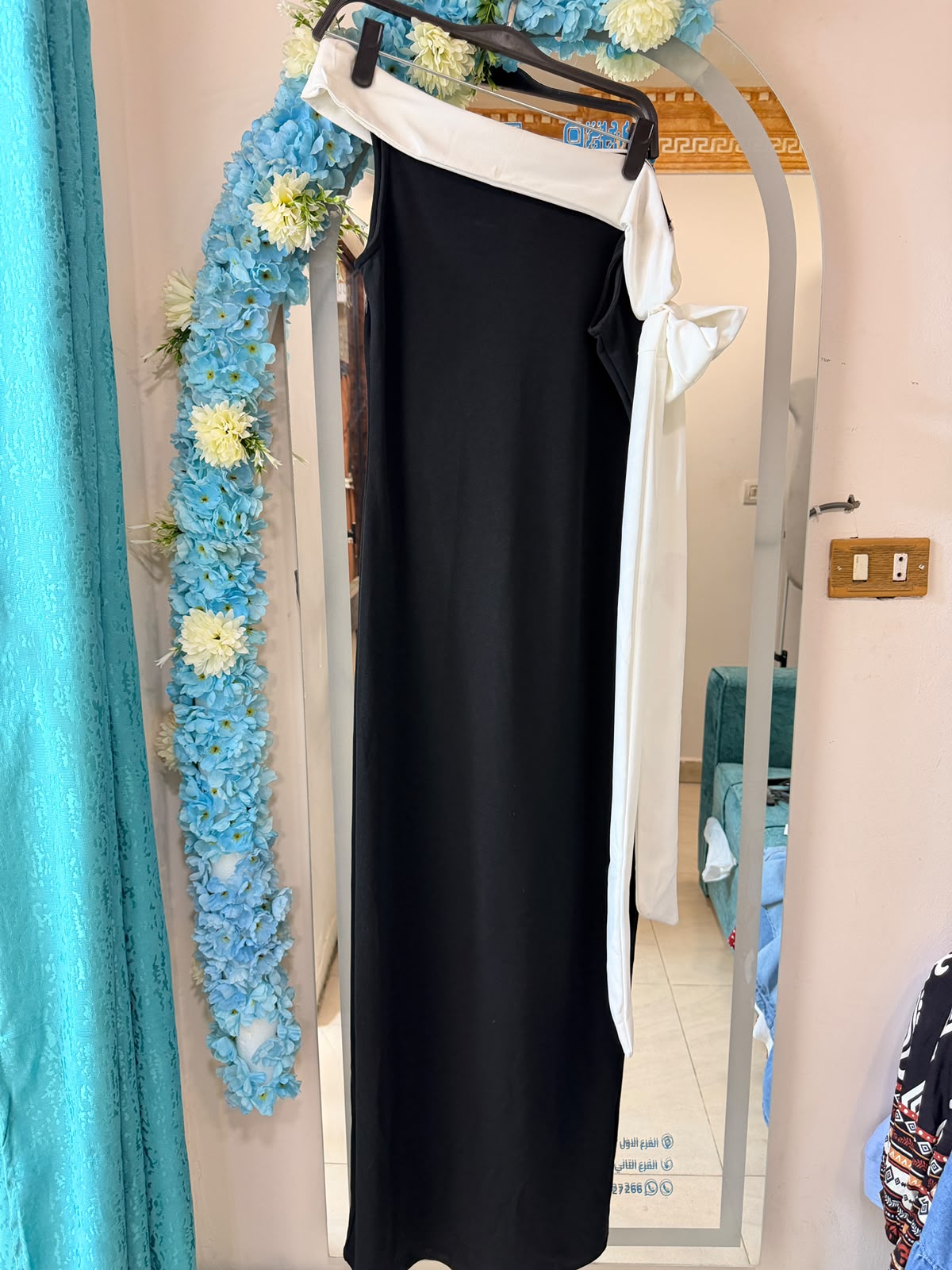 one shoulder black dress with white detailing